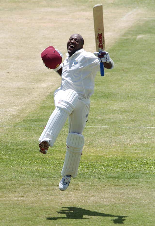 Brian Lara celebrates breaking the world record for a Test innings at the Recreation Ground in 2004.