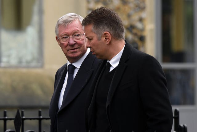 Darren Ferguson (right) has followed his father Sir Alex (left) into football management