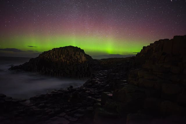 The Northern Lights over the Giant’s Causeway in Northern Ireland