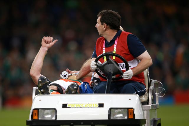 Paul O’Connell gives a thumbs up as he is taken off the pitch after sustaining a career-ending hamstring injury