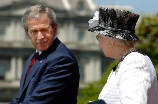 George Bush winks at the Queen