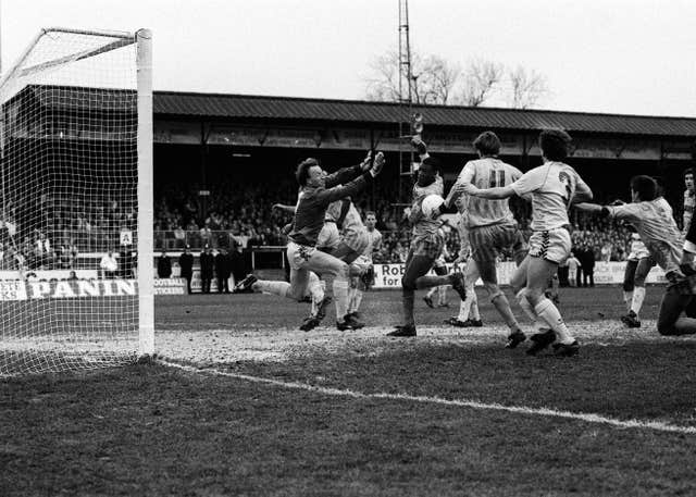 Sutton United's Matthew Hanlan scores