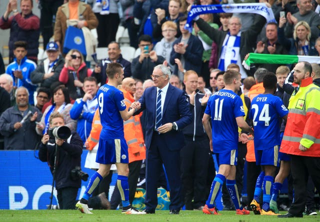 Leicester City manager Claudio Ranieri (centre) celebrates with Jamie Vardy. (PA)