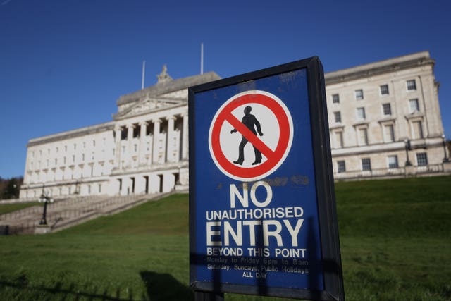 Exterior of Stormont Assembly with no entry sign in foreground