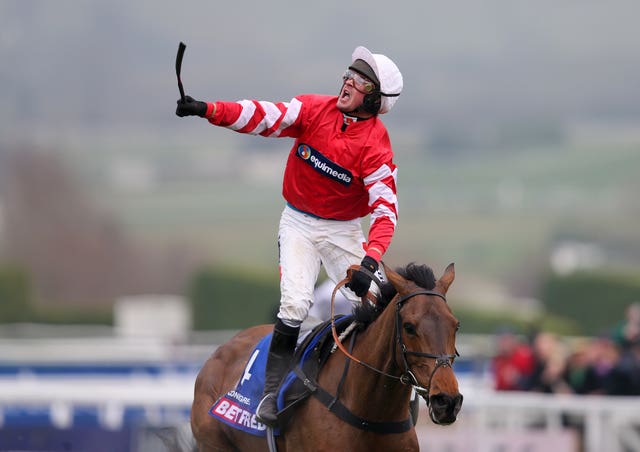 Nico de Boinville celebrates winning the Cheltenham Gold Cup on Coneygree 