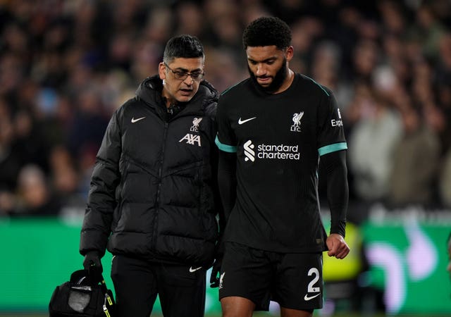 Joe Gomez leaves the field with a hamstring injury