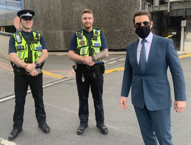 Actor Tom Cruise (right) poses with BTP officers at New Street Station in Birmingham, where he has been filming scenes for the latest installment of the Mission: Impossible series (British Transport Police/PA)