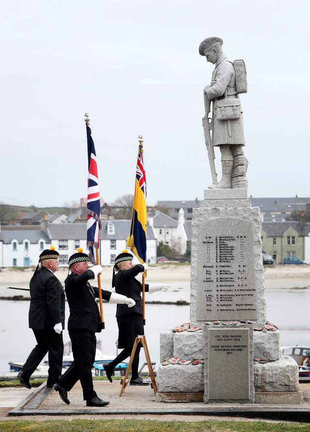 Standard bearers during the commemoration service  (Jane Barlow/PA)