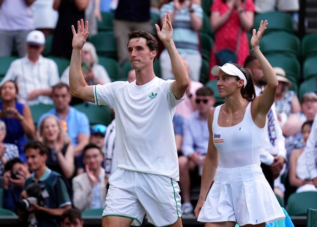 Joe Salisbury and Luisa Stefani wave to the crowd after their mixed doubles final defeat