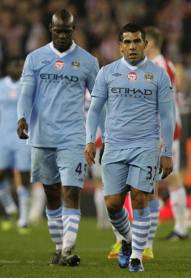 Controversies involving Carlos Tevez (right) and Mario Balotelli (left) overshadowed a lot of City's season