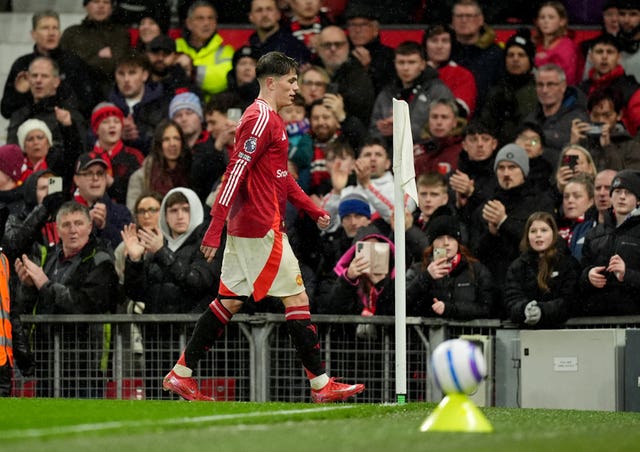 Garnacho walks towards the tunnel after being substituted in United's win over Ipswich (Martin Rickett/PA)