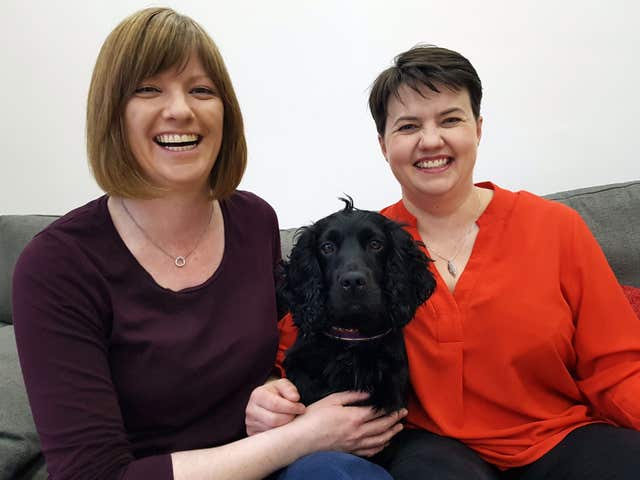 Ruth Davidson (right) is expecting a baby with her partner Jen Wilson (PA)