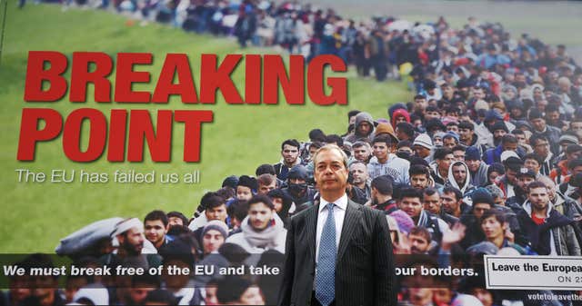 Nigel Farage standing in front of the Breaking Point billboard used during the 2016 EU referendum