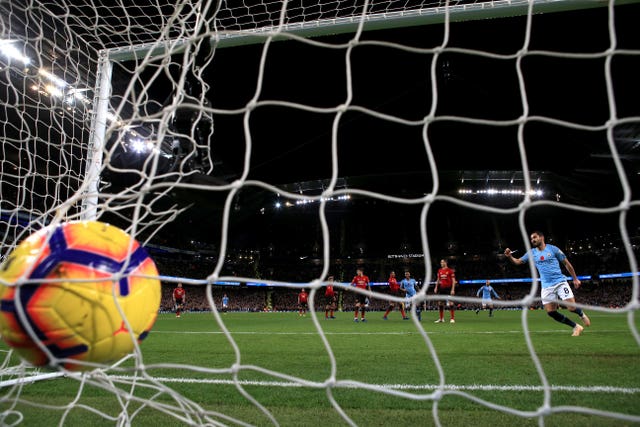 Ilkay Gundogan scores Manchester City's third in their derby victory over Manchester United