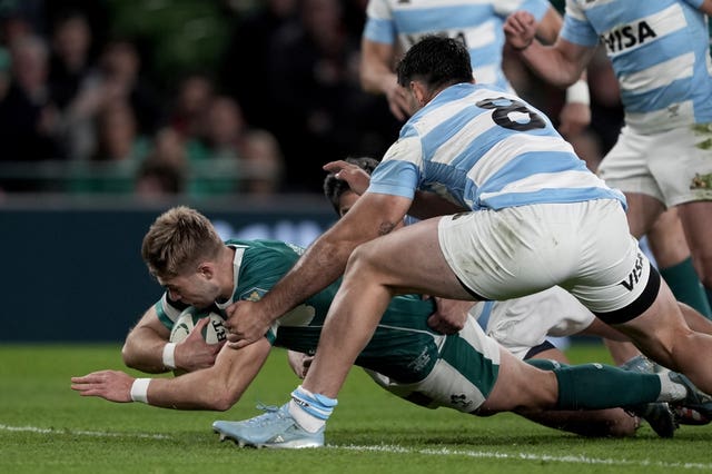  Jack Crowley dives over for Ireland's opening try