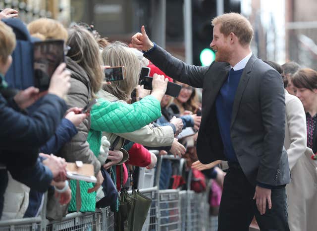 Harry greets wellwishers during a walkabout in Belfast (Gareth Fuller/PA) 