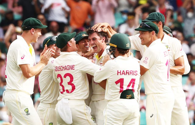 Australia’s Pat Cummins celebrates the wicket of England’s Jos Buttler
