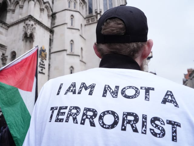 A protester outside the High Court
