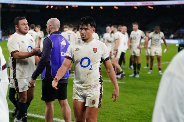 England’s Marcus Smith and team-mates react after their defeat