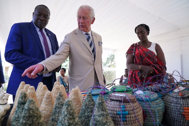 The Prince of Wales touring a reconciliation village
