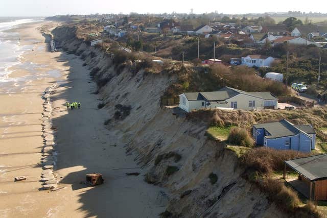 Hemsby in Norfolk is already being hit by coastal erosion which will worsen with climate change (Joe Giddens/PA)