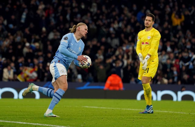 Erling Haaland runs the ball back to halfway after scoring City''s first goal
