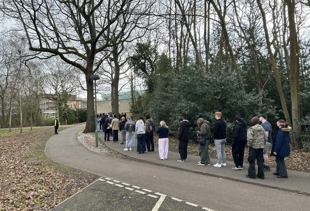 People queueing for jabs