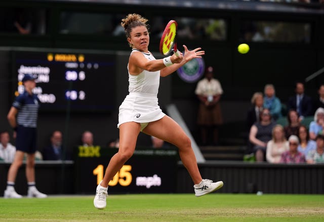 Jasmine Paolini hits a forehand