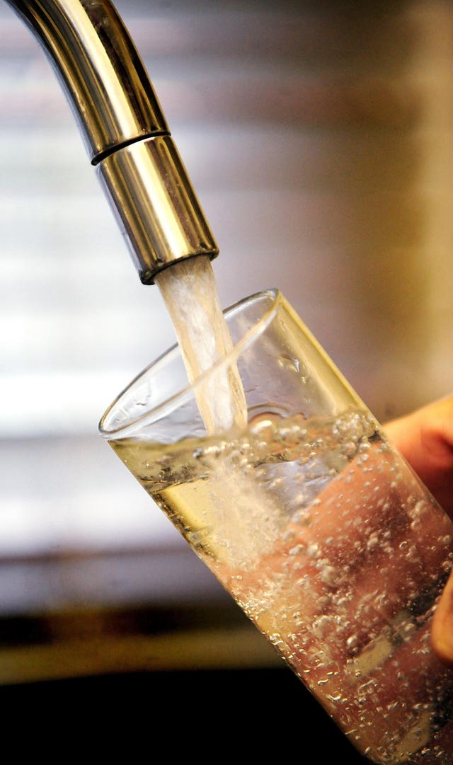 File photo dated 31/01/12 of a glass being filled with water from a tap. 