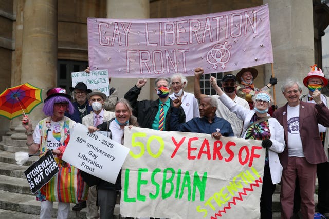 Peter Tatchell (centre) leads a march through London