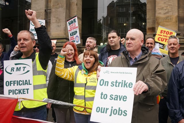 RMT general secretary Mick Lynch, right, joins the picket line outside Newcastle Central station 