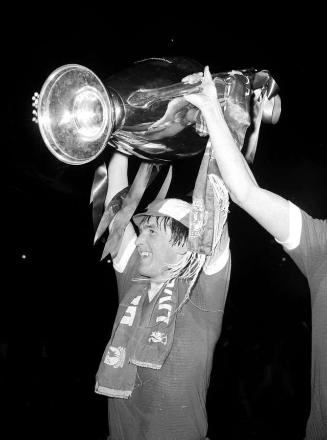 Kenny Dalglish celebrates with the European Cup