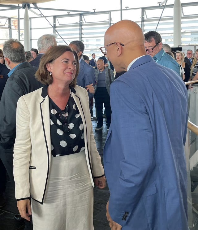 First Minister of Wales Eluned Morgan greeting supporters in the Senedd after being elected as the first female leader of Wales following the resignation of Vaughan Gething