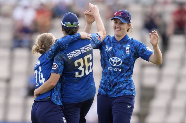 Nat Sciver-Brunt (right) celebrates with England team-mates,