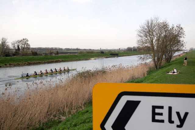 Oxford University Boat Club train on the River Great Ouse near Ely in Cambridgeshire
