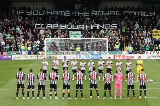 Celtic fans hold up a banner before the match at St Mirren 