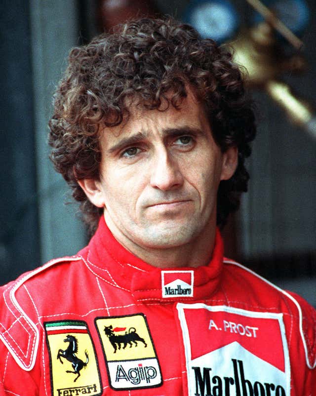 Alain Prost in Ferrari overalls