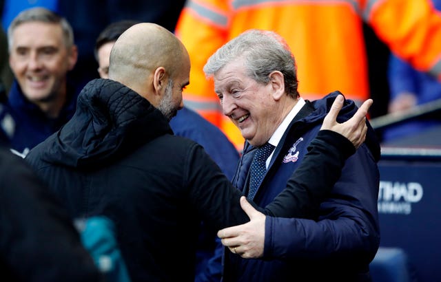 Roy Hodgson (right) does not believe Pep Guardiola (left) will be concerned yet 