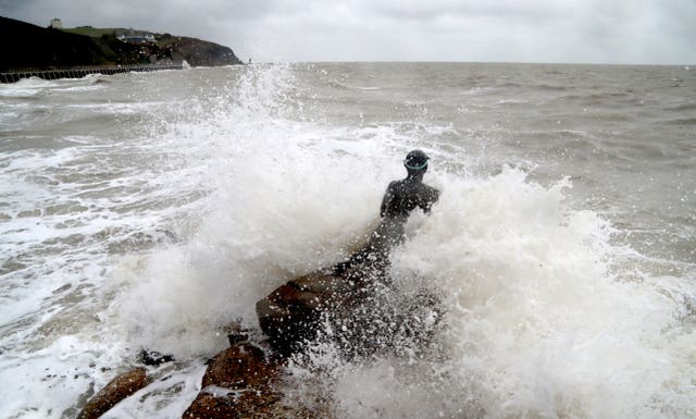 Stormy seas around the Folkestone Mermaid statue