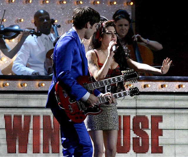 Mark Ronson and Amy Winehouse on stage at the Brit Awards 2008 show in London