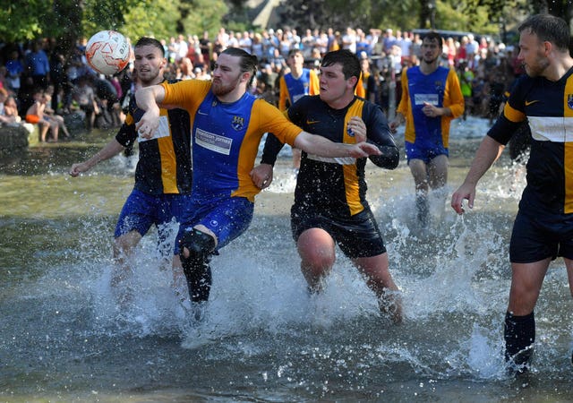 Annual Football in the River match