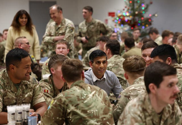 Rishi Sunak eats Christmas dinner with troops