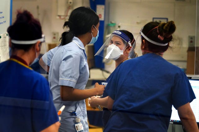 Doctors and nurses wearing protective equipment during coronavirus pandemic