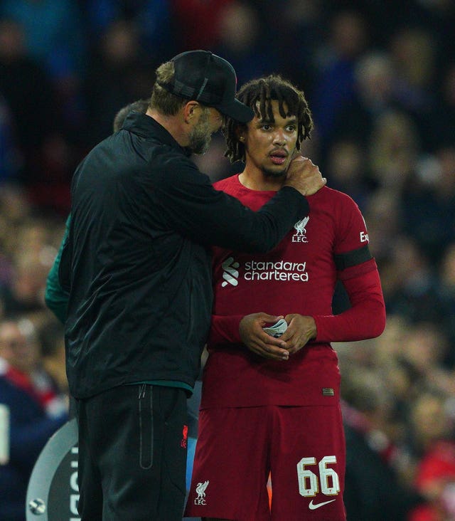 Jurgen Klopp, left, speaks with Trent Alexander-Arnold during the game against Rangers