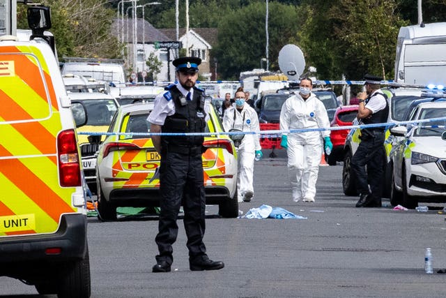 Forensic officers on Hart Street in Southport, Merseyside