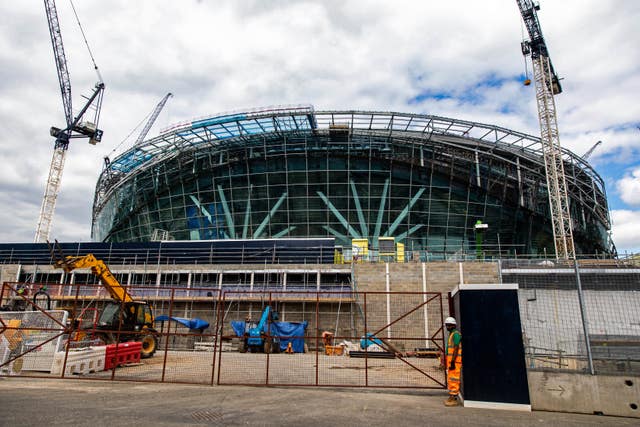 Tottenham's new stadium has been delayed by contractors missing deadlines