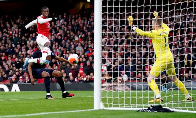 Eddie Nketiah, left, scores Arsenal's first goal
