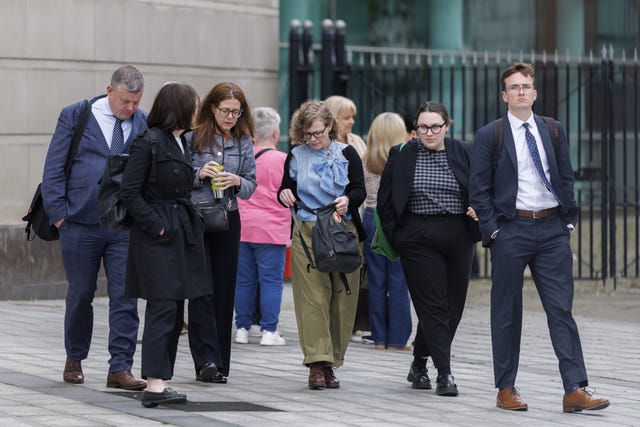 Fiona Donohoe walking amongst a group outside court