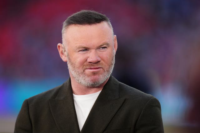Wayne Rooney looking to the side