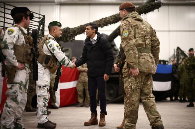 Rishi Sunak talks with French troops